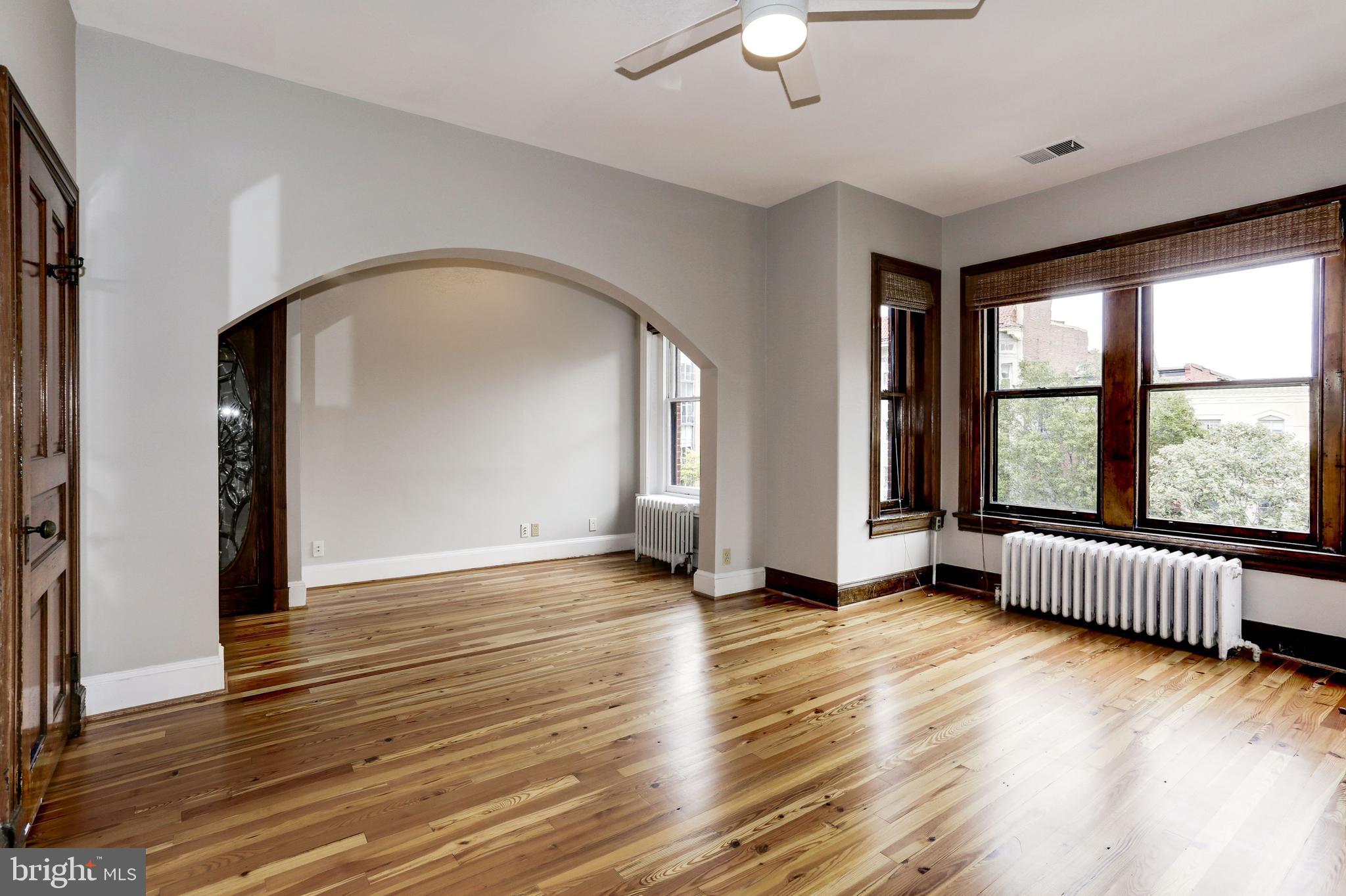 1410 15th Street Northwest Washington, DC 20005 - Photo 28 of 50 New pinewood floors in the spacious third bedroom