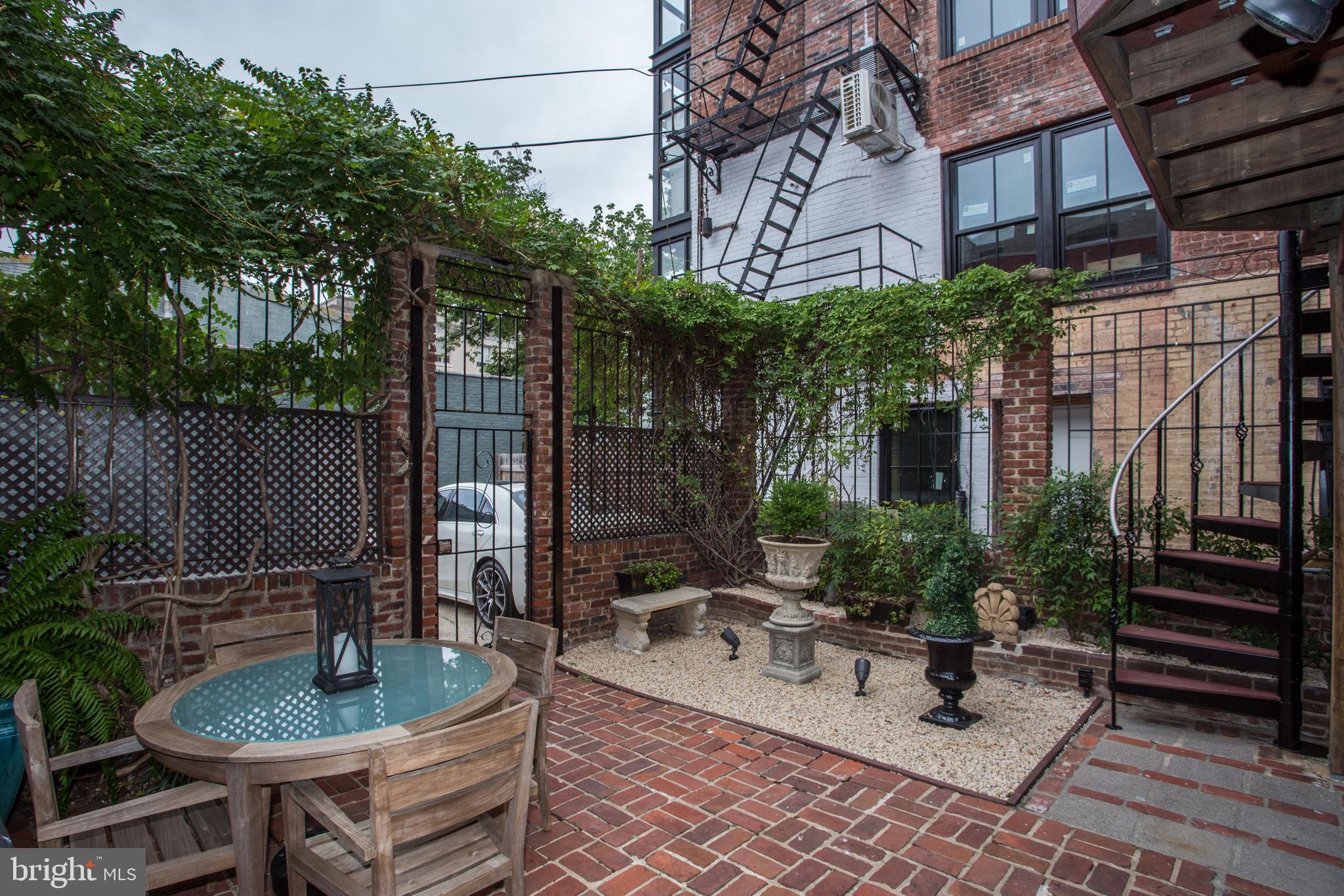 1410 15th Street Northwest Washington, DC 20005 - Photo 39 of 50 Two car parking spaces just outside of the patio