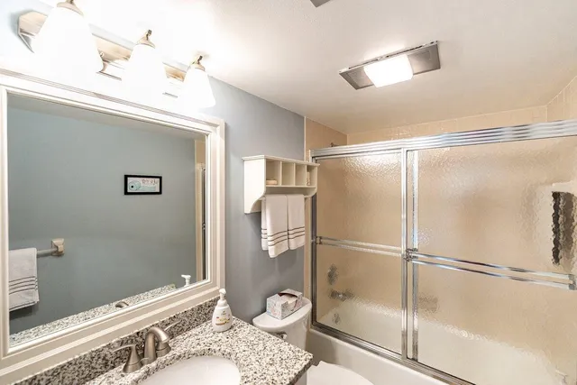 a view of a balcony with ocean view