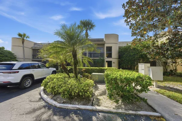 an aerial view of house with a yard