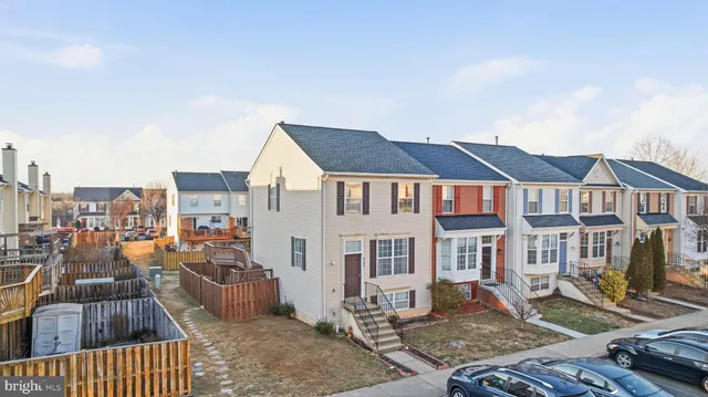 an aerial view of a city with lots of residential buildings