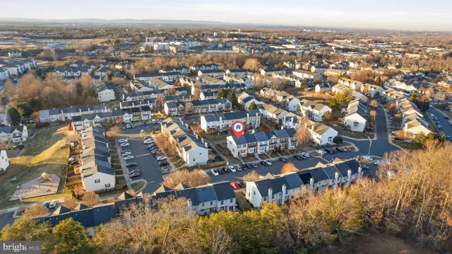 an aerial view of multiple house
