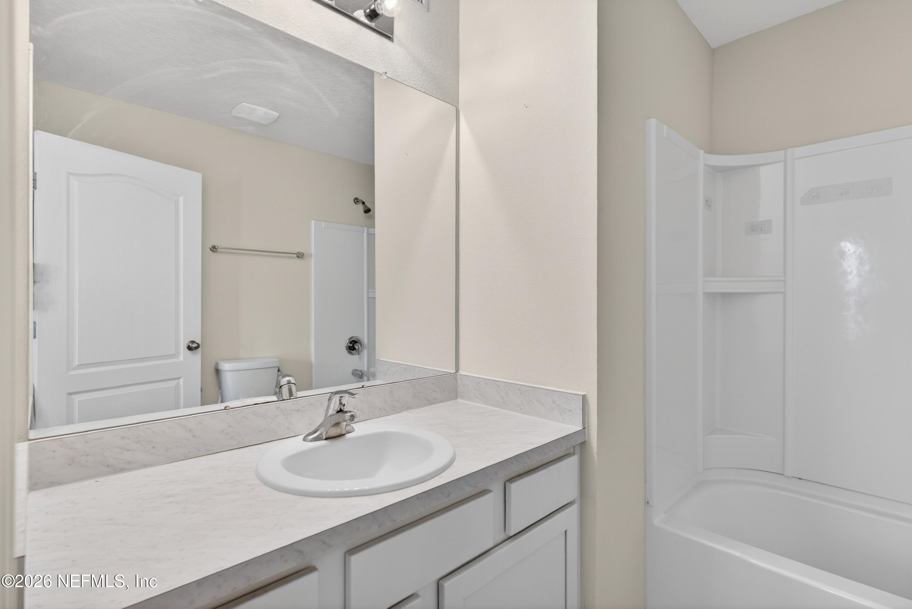 8210 Larose Road Jacksonville, FL 32211 - Photo 21 of 38 a bathroom with a sink and a bathtub