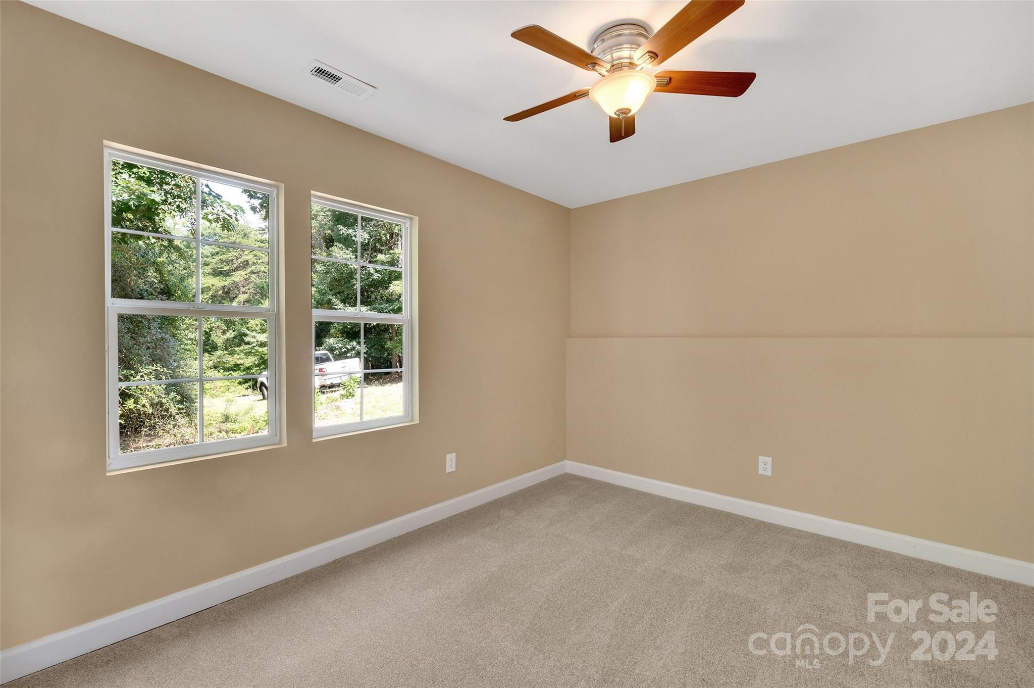 3076 Point Clear Drive Tega Cay, SC 29708 - Photo 14 of 28 a view of an empty room with a window