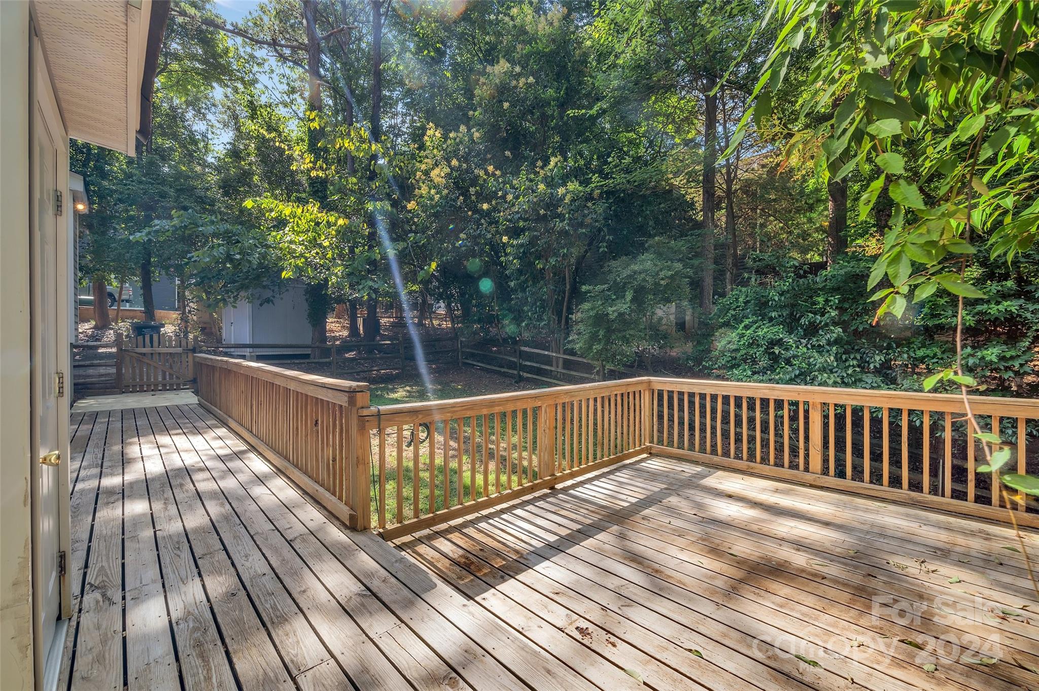 3076 Point Clear Drive Tega Cay, SC 29708 - Photo 21 of 28 a view of balcony with wooden floor and outdoor space
