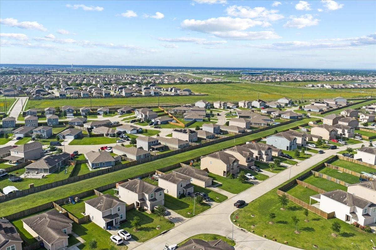 5727 Treasure Cove Road Cove, TX 77523 - Photo 15 of 20 a view of a city with an ocean
