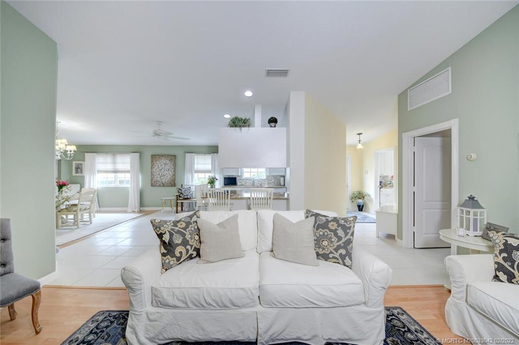 786 Southwest Balmoral Trace Stuart, FL 34997 - Photo 7 of 35 Living Room view into the kitchen