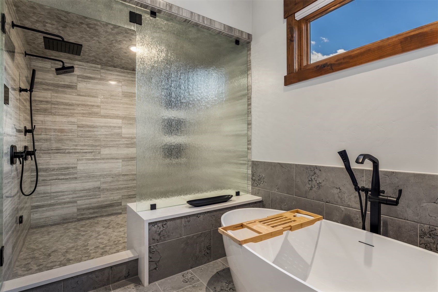 99 Independence Lane Keystone, CO 80435 - Photo 19 of 50 a bathroom with a sink a toilet and shower