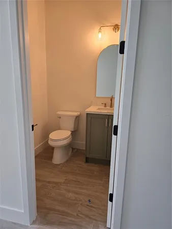 a bathroom with a toilet and a sink