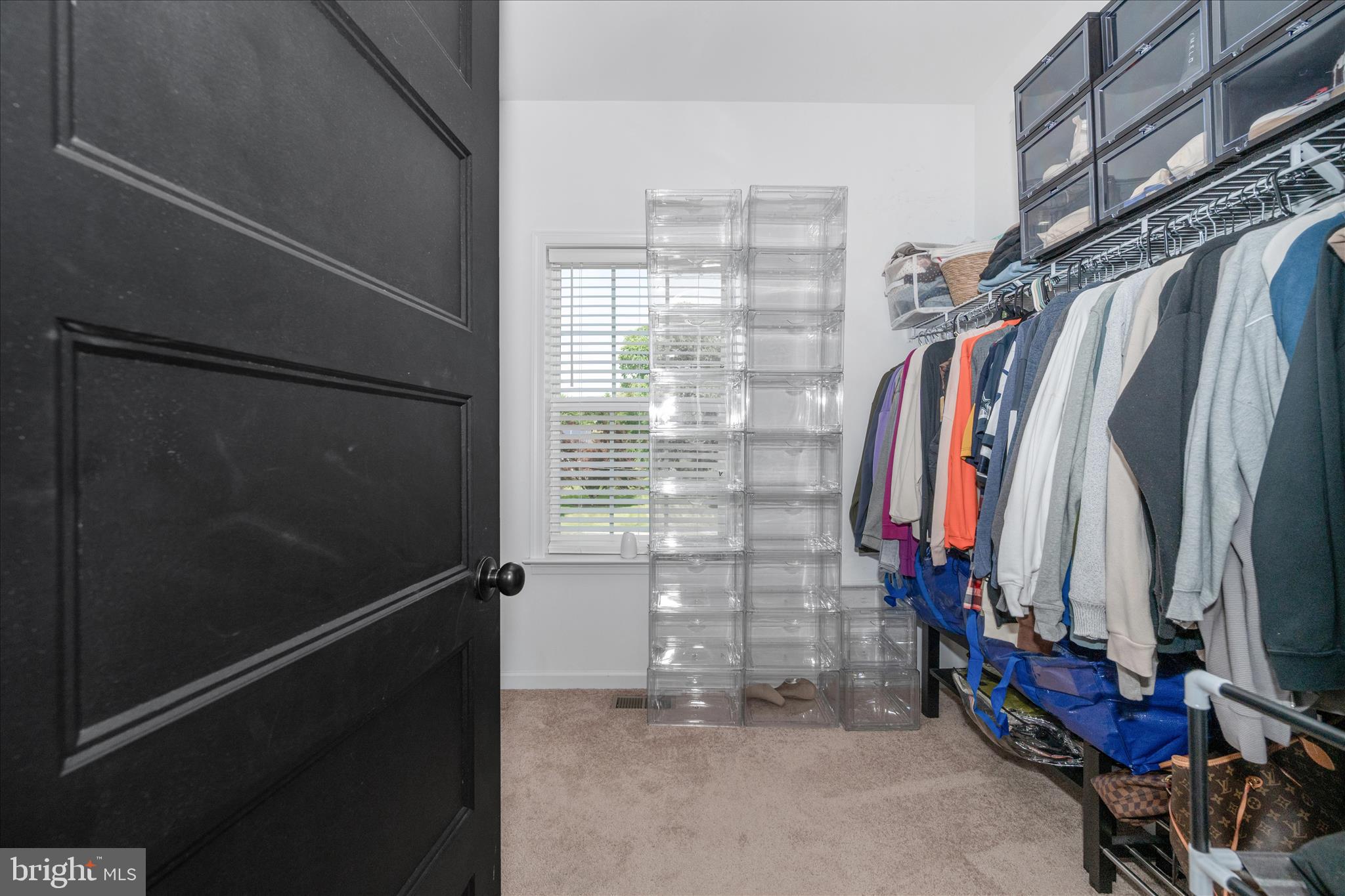 1388 Rocky Springs Road Frederick, MD 21702 - Photo 32 of 97 a view of walk in closet with clothes