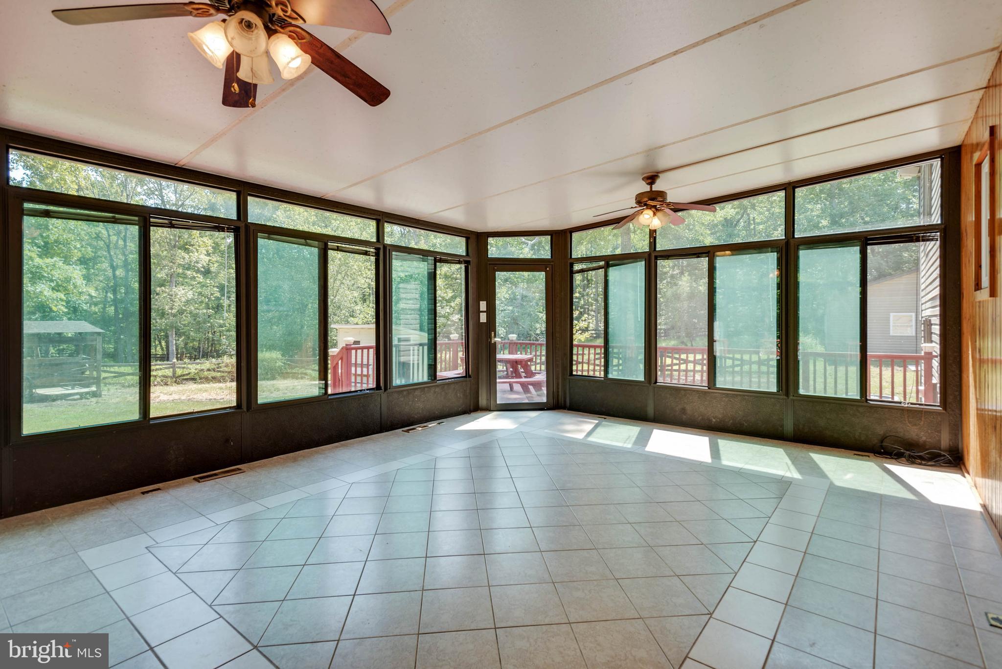 105 Eley Road Fredericksburg, VA 22406 - Photo 15 of 38 Huge sunroom