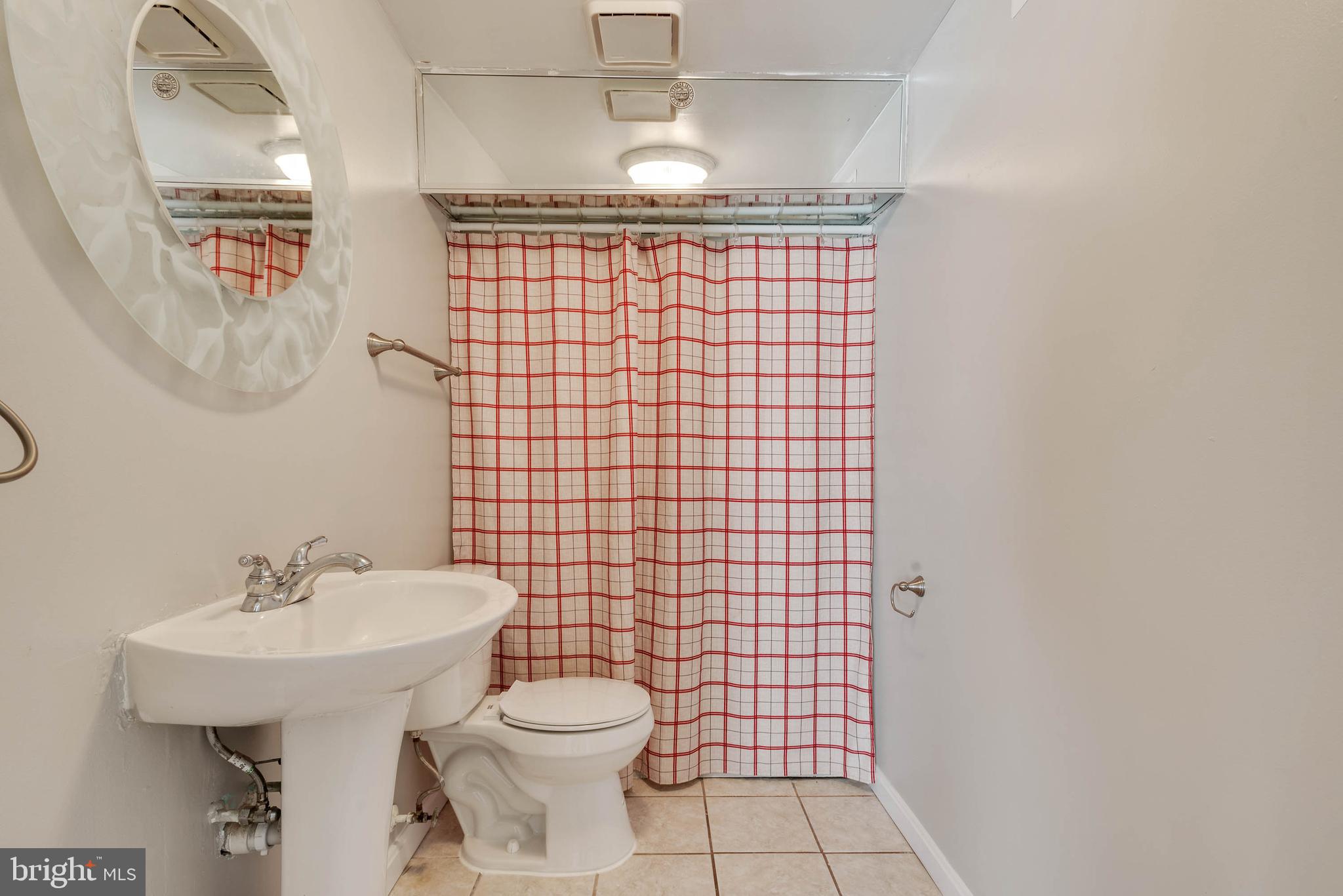 105 Eley Road Fredericksburg, VA 22406 - Photo 26 of 38 Half bathroom in the basement