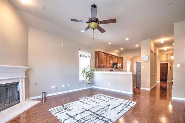 a view of a kitchen with a sink and a window