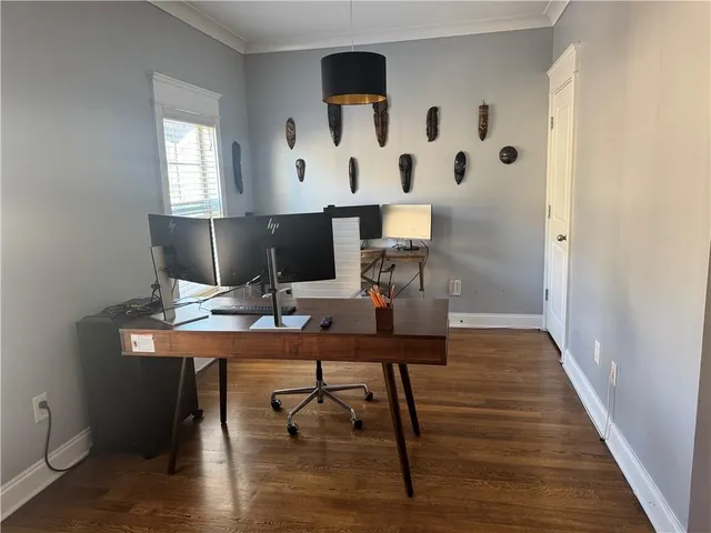 a view of balcony with wooden floor and outdoor seating