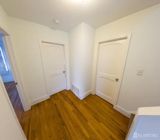 a bathroom with a sink a mirror and a bathtub