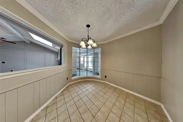 a view of an empty room with window