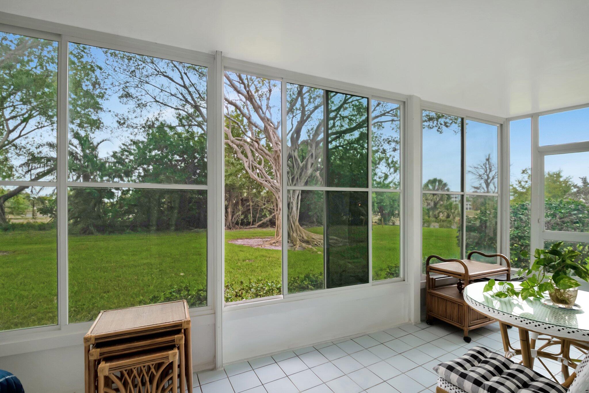 6461 Northwest 2nd Avenue, Unit 1160 Boca Raton, FL 33487 - Photo 20 of 26 a garden view with a seating space and garden view