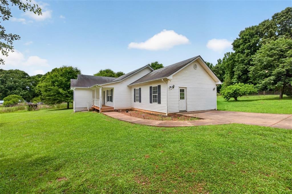 602 Pendergrass Road Winder, GA 30680 - Photo 5 of 44 a view of a house with a backyard