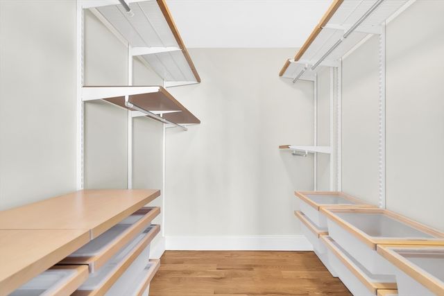 a bathroom with a tub and a sink
