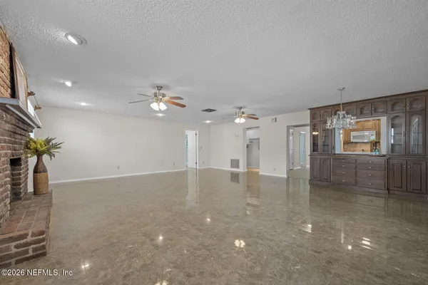 a view of a livingroom with a ceiling fan