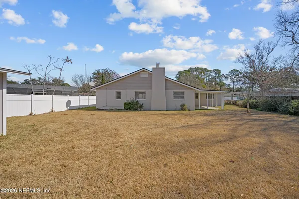a bathroom with a sink vanity and snow