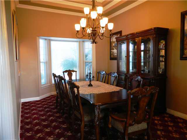 11742 Betsworth Road Valley Center, CA 92082 - Photo 15 of 21 The dining room is spacious and has a gorgeous coffered ceiling.