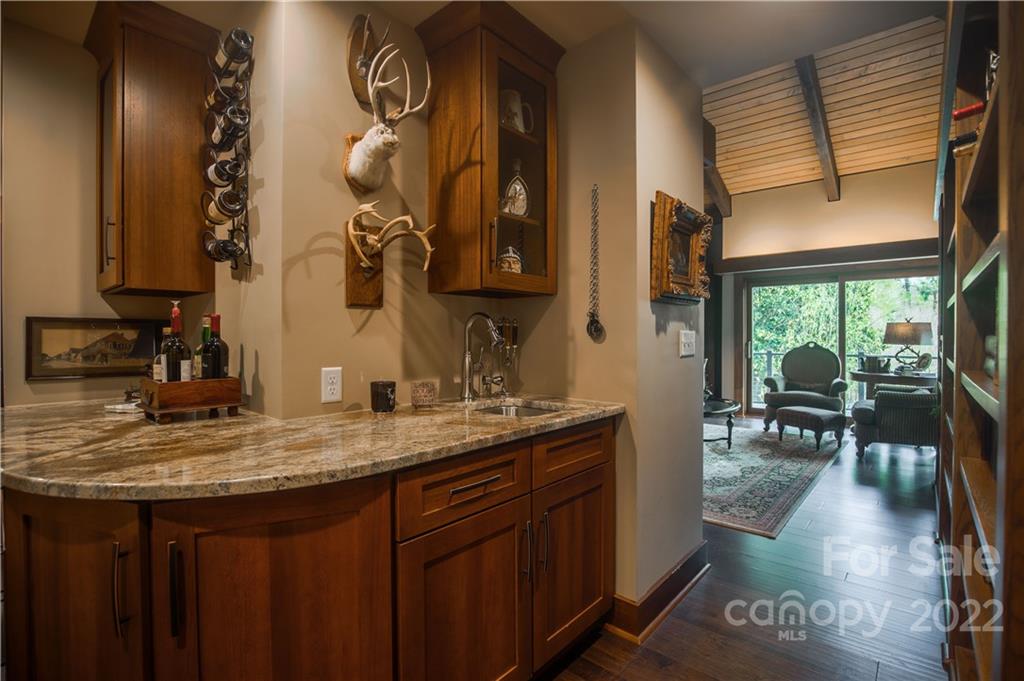 560 Club Road Tryon, NC 28782 - Photo 20 of 48 a bathroom with a sink and a mirror