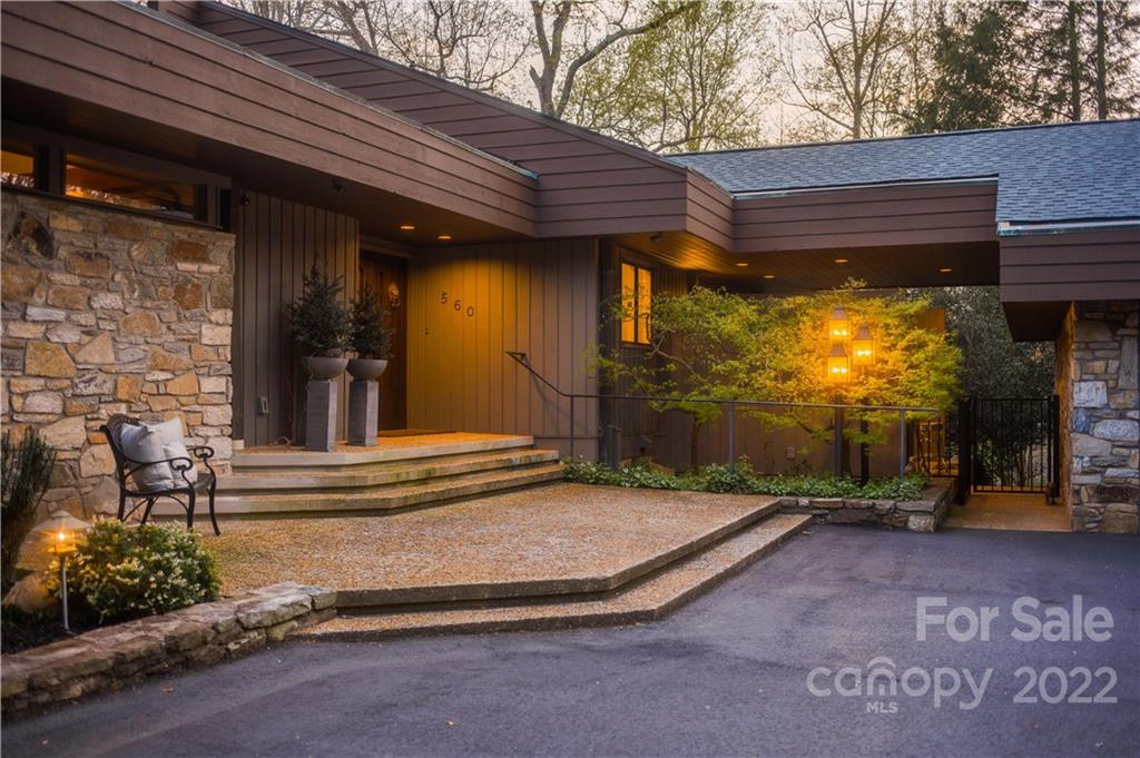 560 Club Road Tryon, NC 28782 - Photo 2 of 48 a view of a house with brick walls