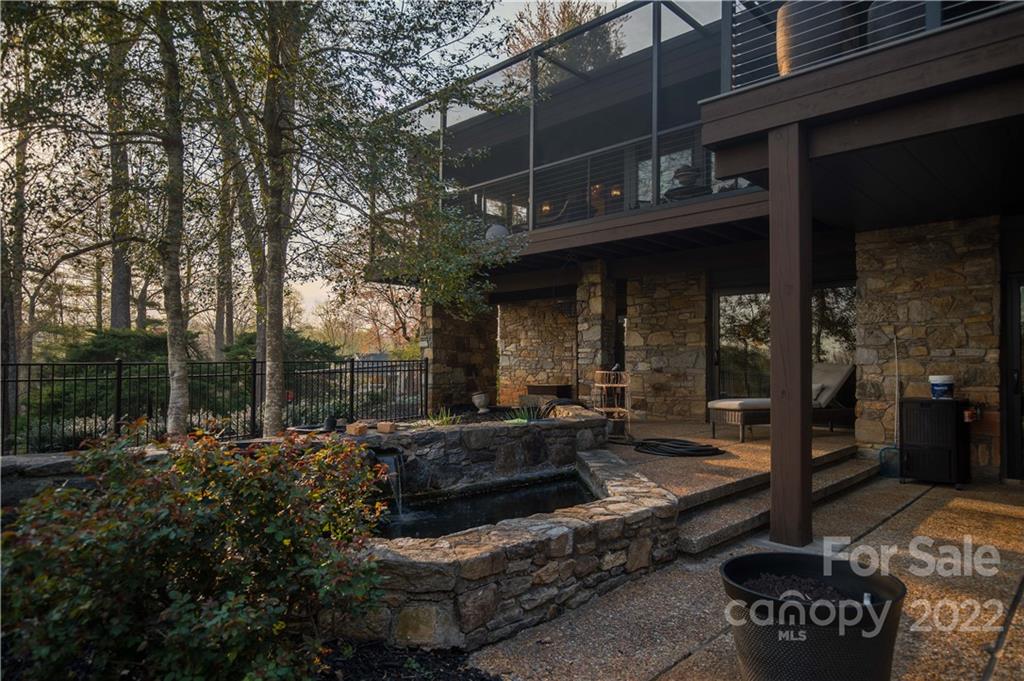 560 Club Road Tryon, NC 28782 - Photo 44 of 48 a view of a chairs and table in the patio