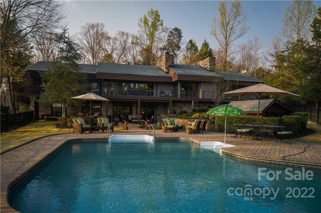 560 Club Road Tryon, NC 28782 - Photo 5 of 48 an outdoor space with pool table and chairs
