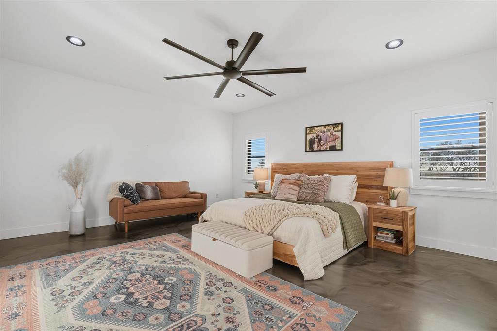 519 Wimberly Road Merkel, TX 79536 - Photo 23 of 40 a bedroom with a bed and a couch