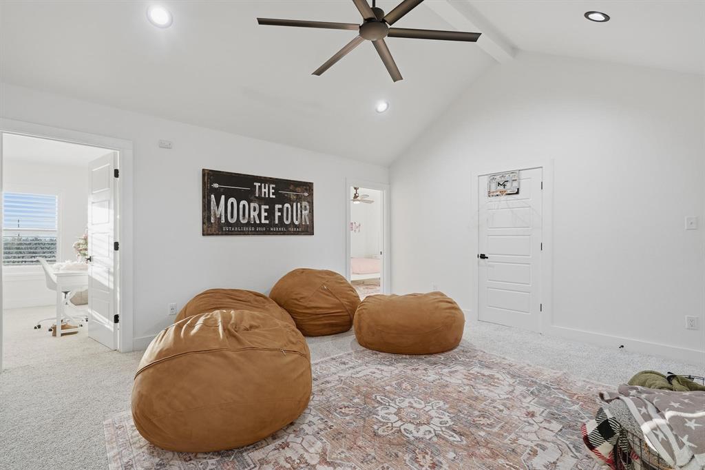 519 Wimberly Road Merkel, TX 79536 - Photo 32 of 40 a view of a livingroom with furniture and a chandelier fan