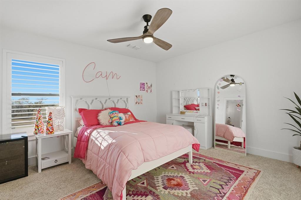 519 Wimberly Road Merkel, TX 79536 - Photo 37 of 40 a bedroom with a bed and a window