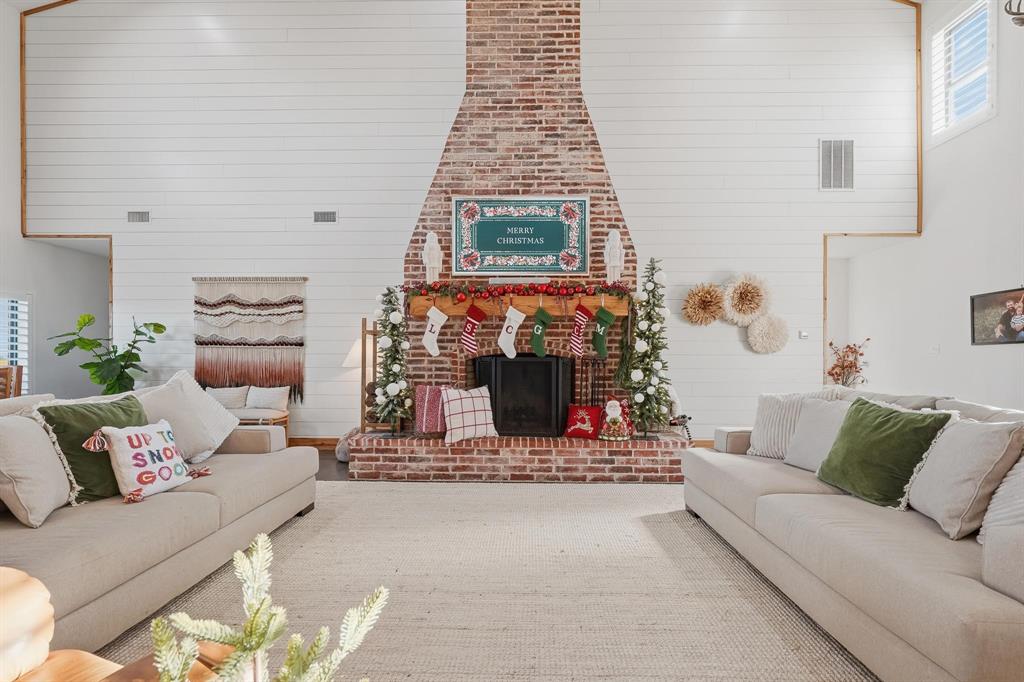 519 Wimberly Road Merkel, TX 79536 - Photo 5 of 40 a living room with furniture and a fireplace