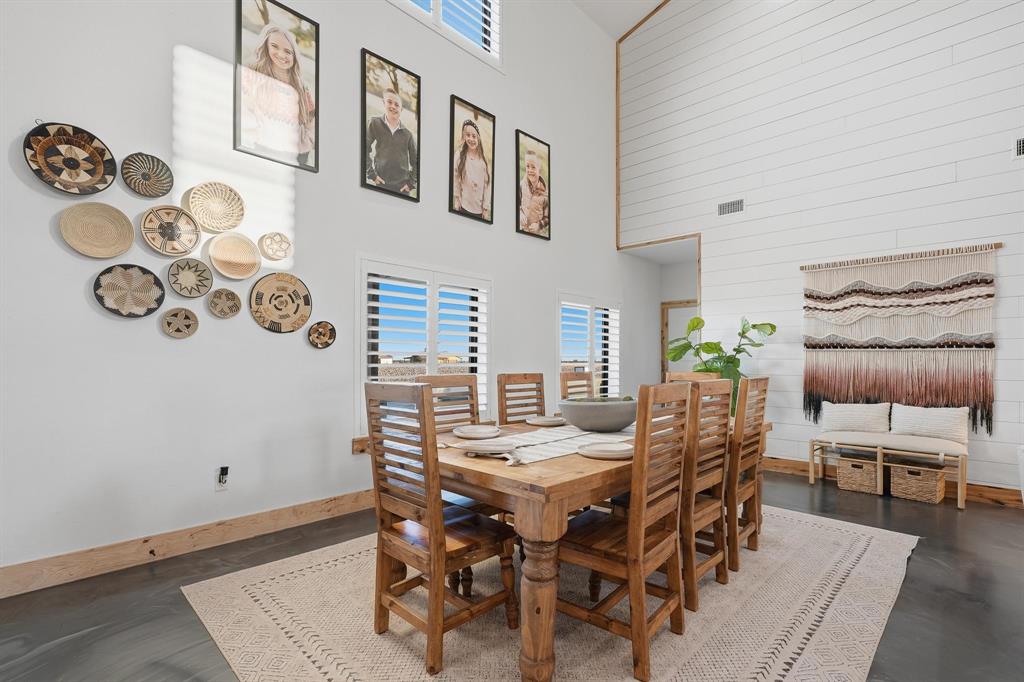 519 Wimberly Road Merkel, TX 79536 - Photo 6 of 40 a view of a dining room with furniture and wooden floor