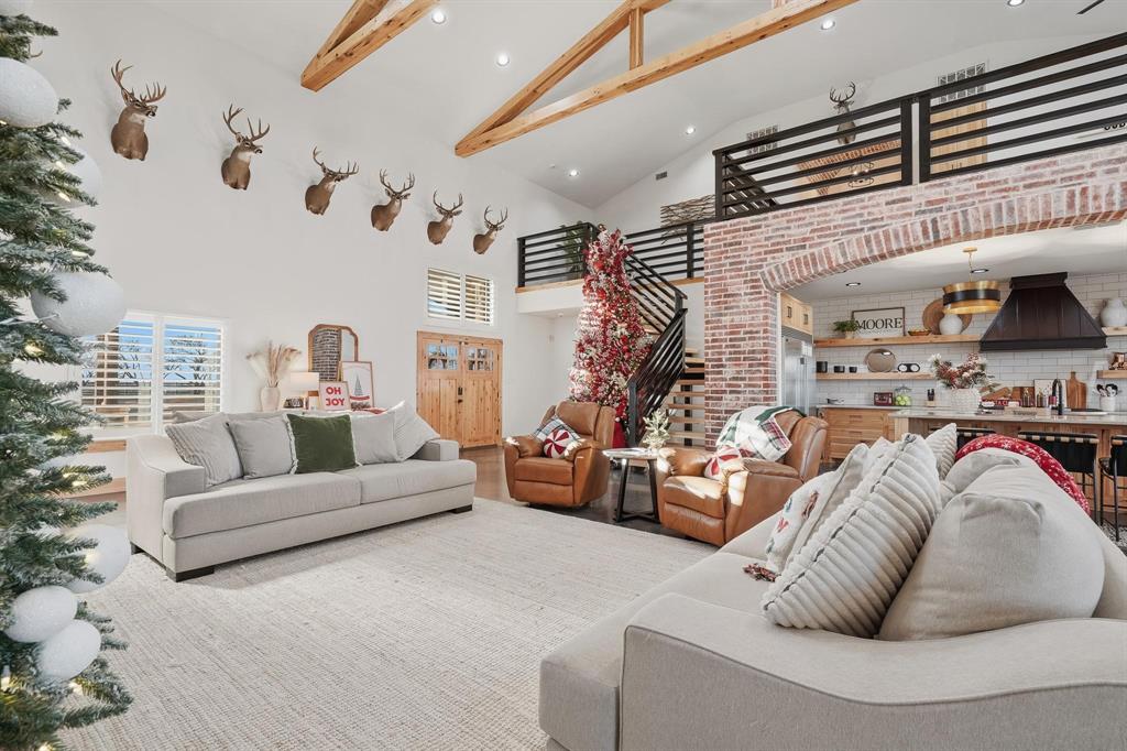 519 Wimberly Road Merkel, TX 79536 - Photo 10 of 40 a living room with furniture fireplace and a couch