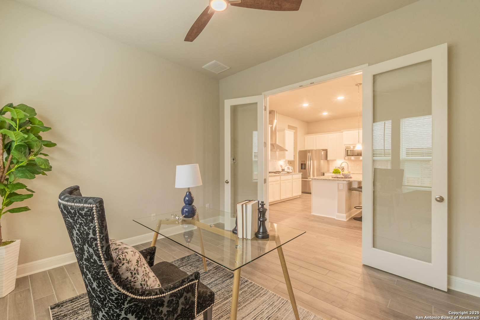 108 Rosanna Ridge Universal City, TX 78148 - Photo 14 of 58 a view of a dining room with furniture and a chandelier