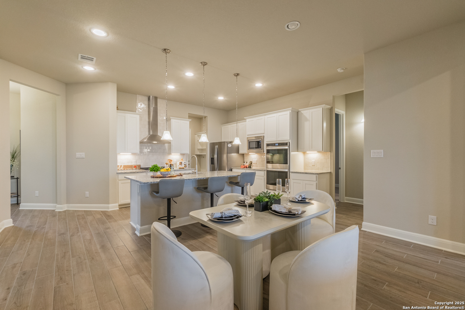 108 Rosanna Ridge Universal City, TX 78148 - Photo 19 of 58 a kitchen with a sink and chairs