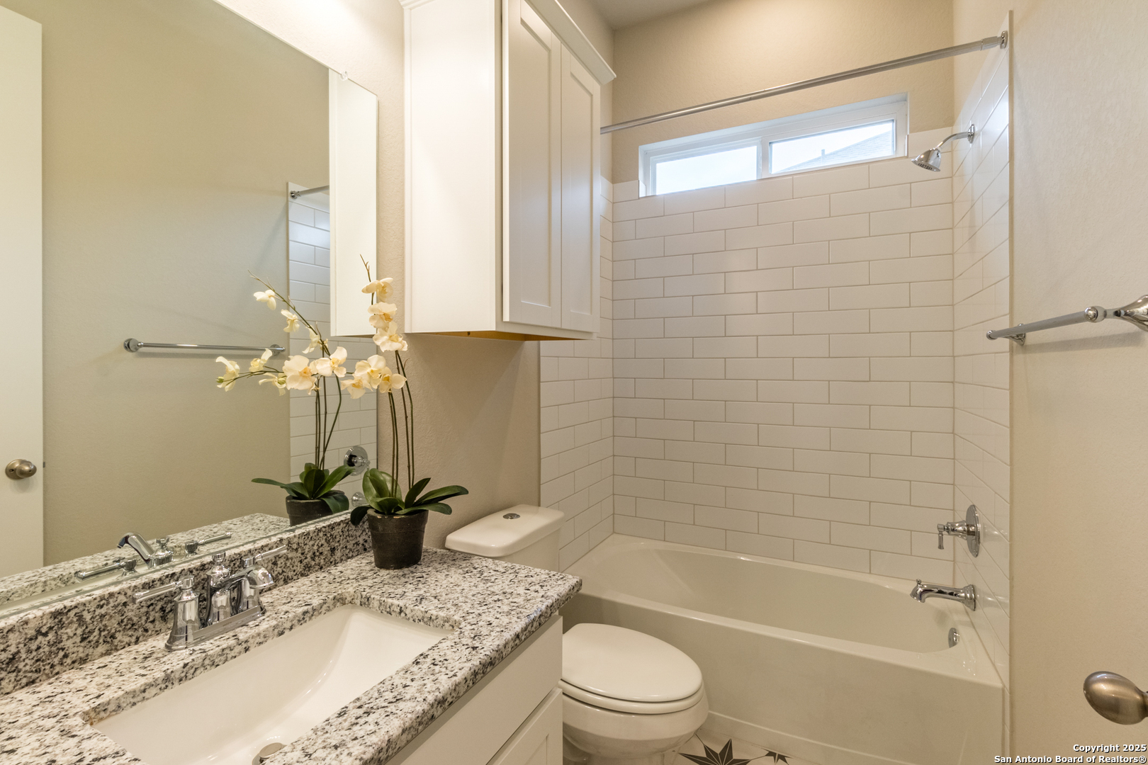 108 Rosanna Ridge Universal City, TX 78148 - Photo 35 of 58 a bathroom with a granite countertop sink a toilet and shower