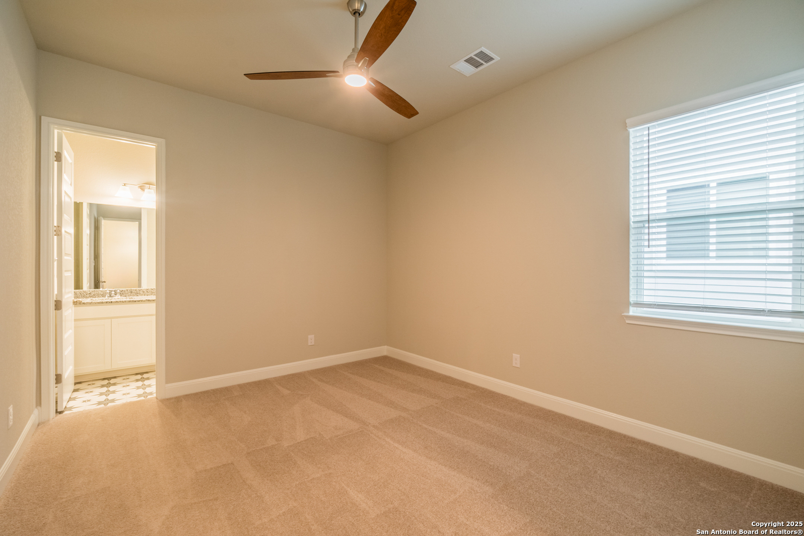 108 Rosanna Ridge Universal City, TX 78148 - Photo 39 of 58 an empty room with a empty space and windows