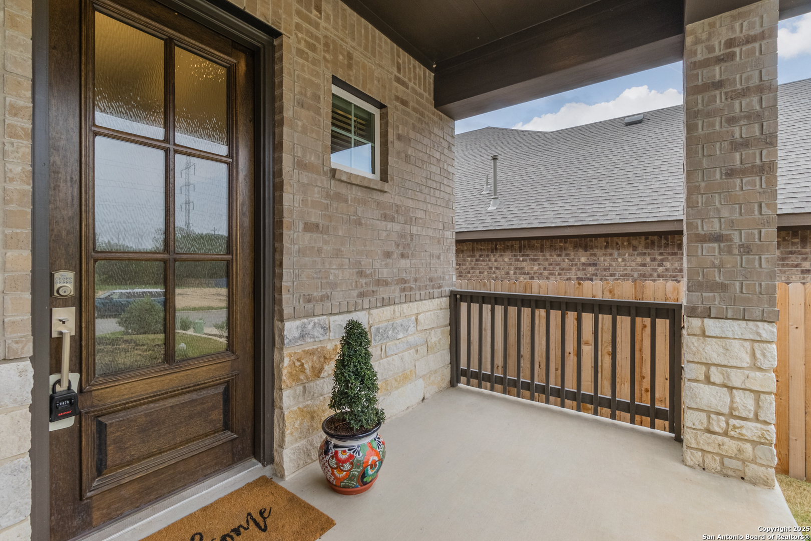 108 Rosanna Ridge Universal City, TX 78148 - Photo 4 of 58 a view of a porch with a door and wooden floor