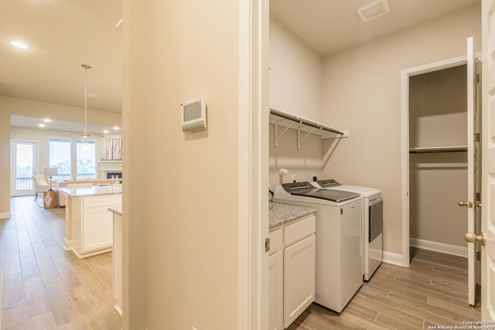 108 Rosanna Ridge Universal City, TX 78148 - Photo 46 of 58 a kitchen with white cabinets and white appliances