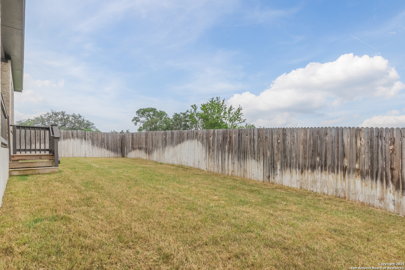 108 Rosanna Ridge Universal City, TX 78148 - Photo 52 of 58 a backyard of a house with lots of green space