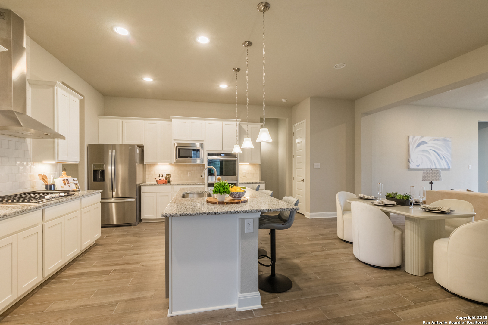 108 Rosanna Ridge Universal City, TX 78148 - Photo 7 of 58 a kitchen with a sink stove and refrigerator
