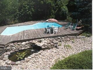 429 Leopard Road Berwyn, PA 19312 - Photo 4 of 5 a view of a backyard with sitting area
