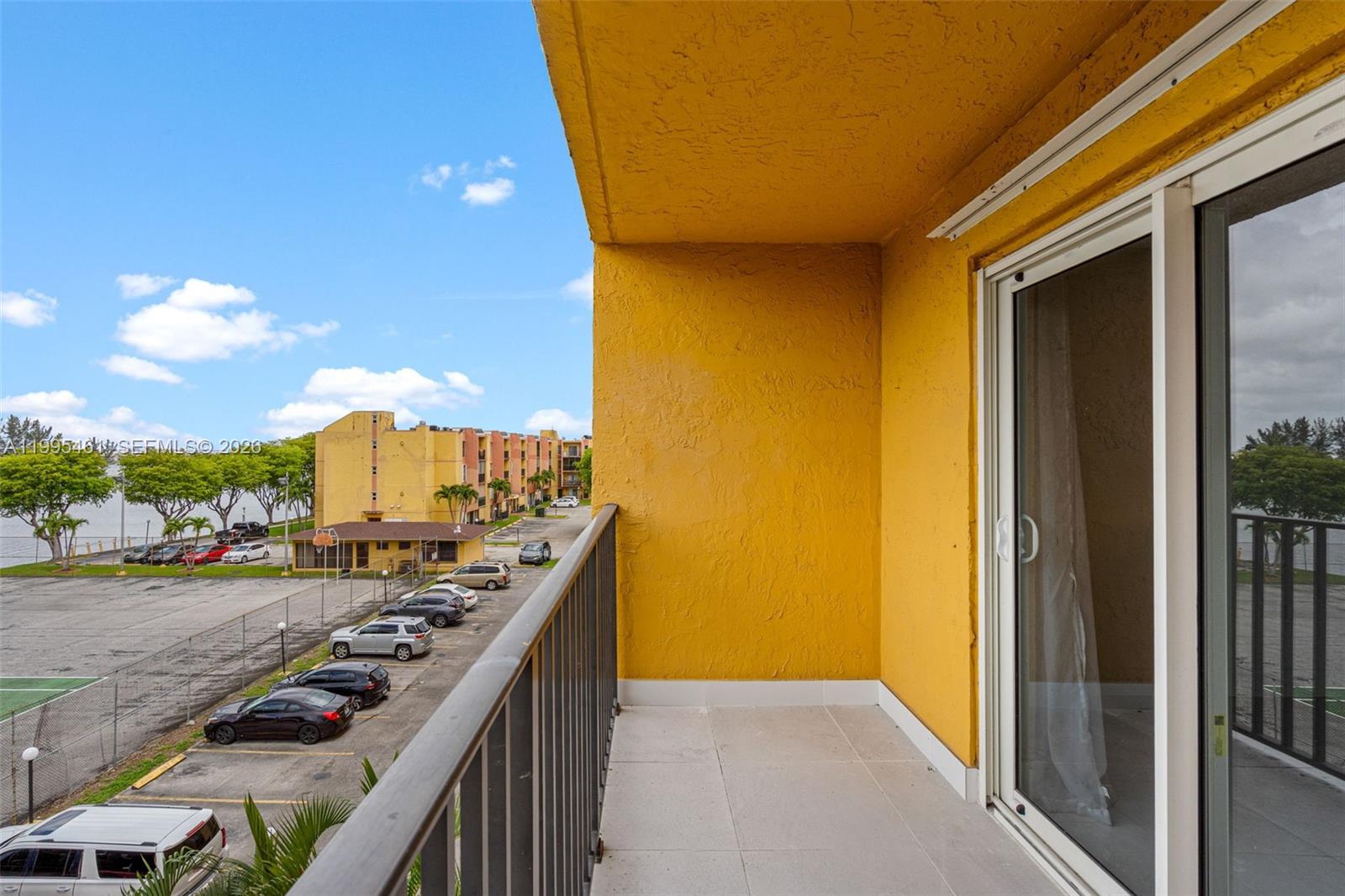 4801 Northwest 7th Street, Unit 40716 Miami, FL 33126 - Photo 20 of 26 a view of a swimming pool with a lounge chair