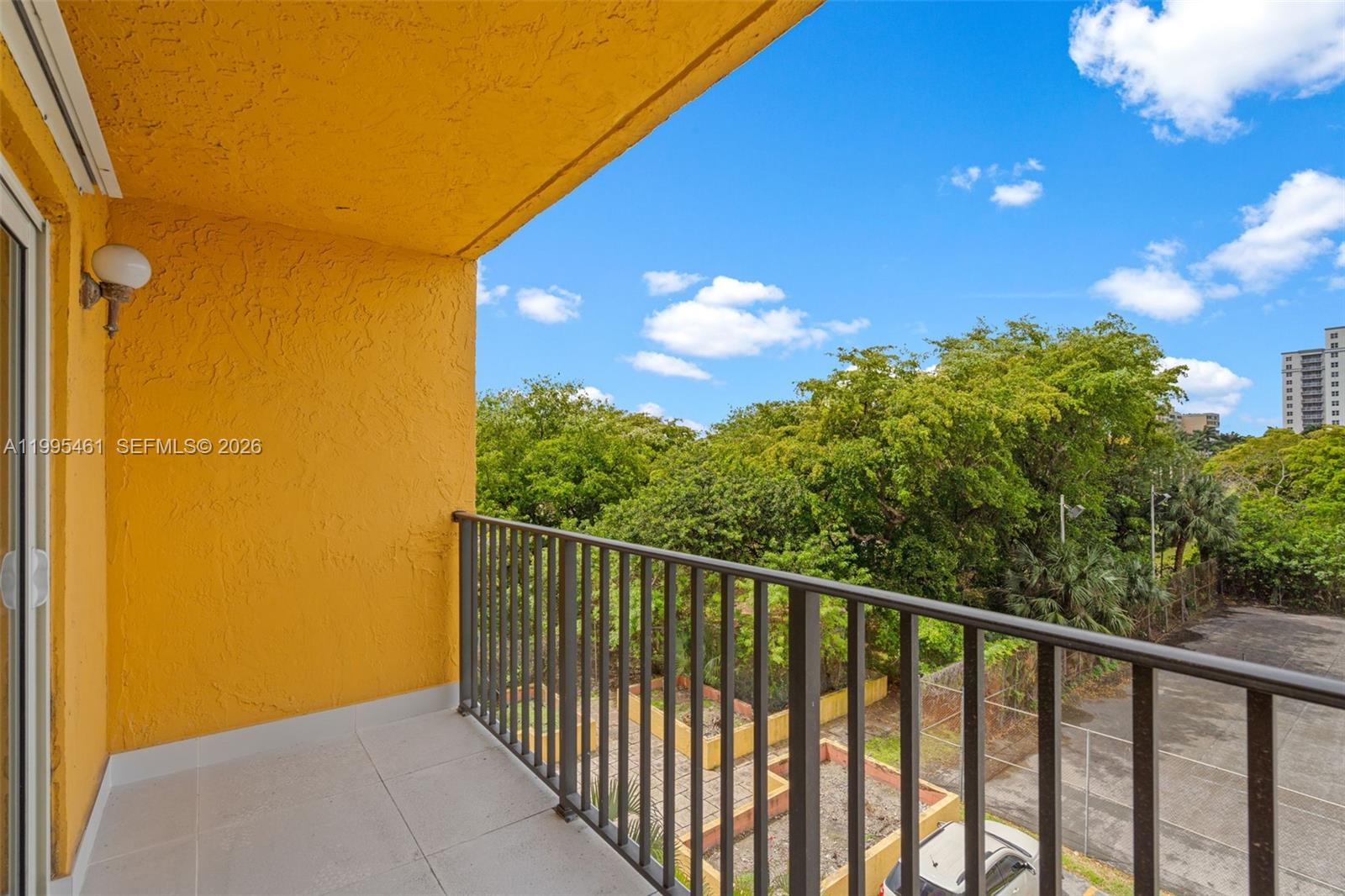 4801 Northwest 7th Street, Unit 40716 Miami, FL 33126 - Photo 21 of 26 a view of a balcony