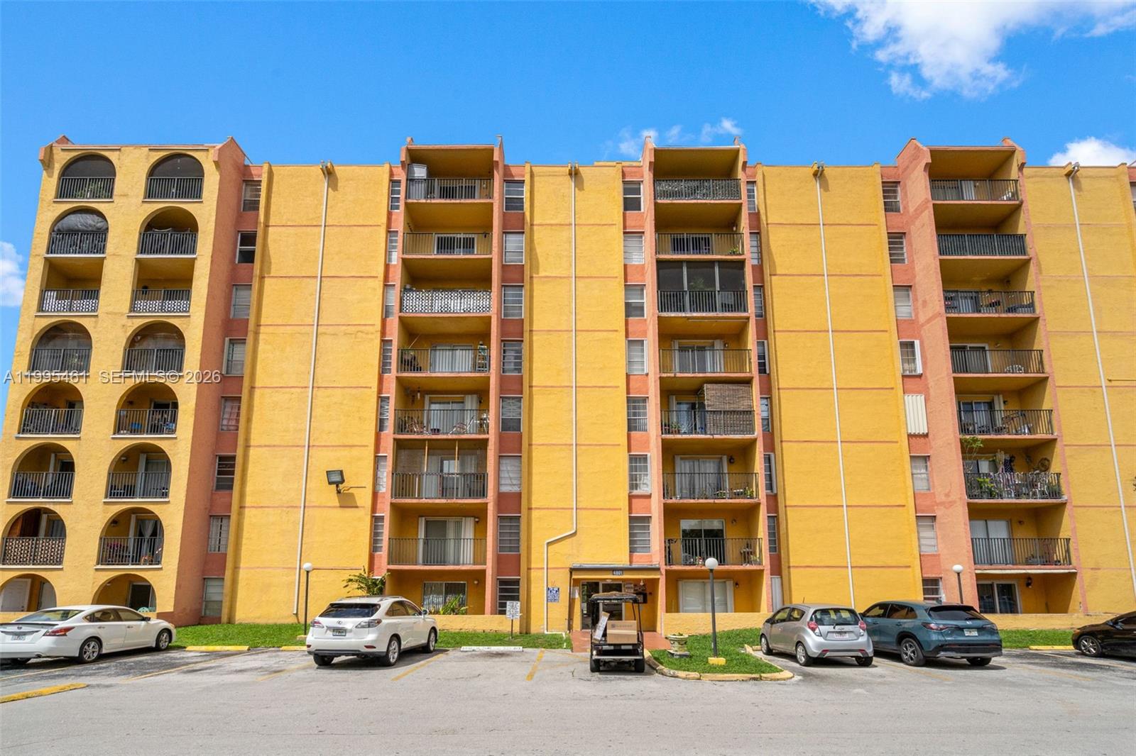 4801 Northwest 7th Street, Unit 40716 Miami, FL 33126 - Photo 26 of 26 a car parked in front of a building