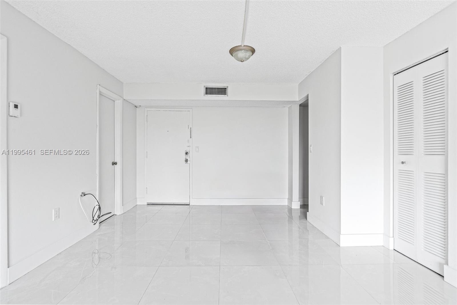 4801 Northwest 7th Street, Unit 40716 Miami, FL 33126 - Photo 6 of 26 a view of an empty room