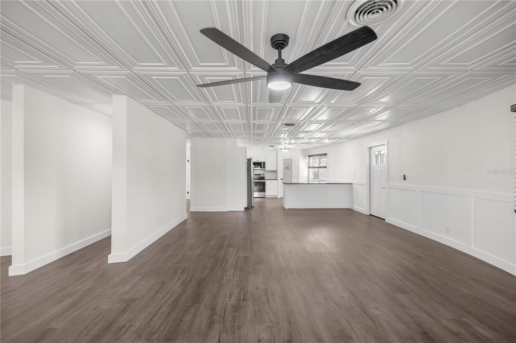 6391 Southeast 186 Terrace Morriston, FL 32668 - Photo 11 of 53 a view of empty room with wooden floor